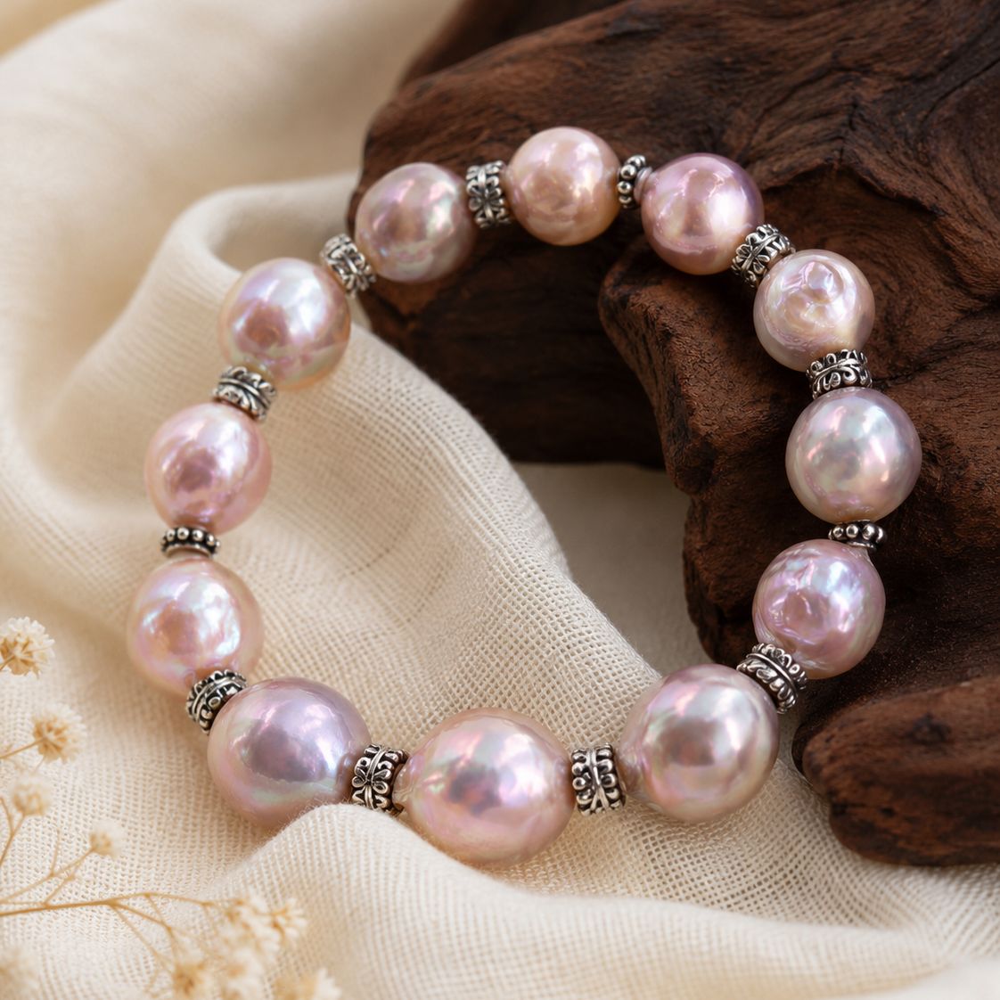 Close-up of irregular iridescent freshwater pearls and vintage Tai silver spacer beads in Serena Iridescent Freshwater Pearl Bracelet