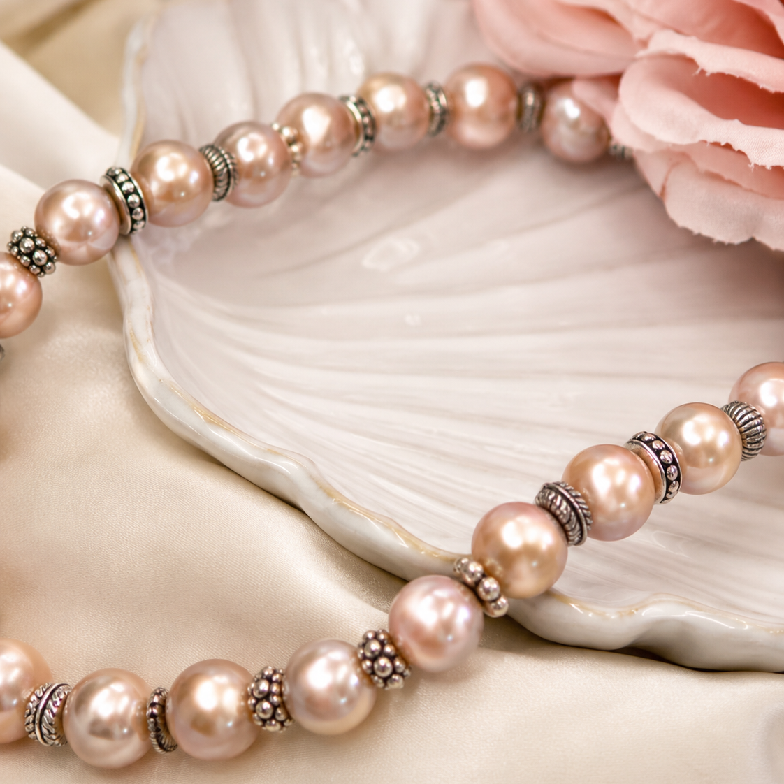 Close-up of champagne pink freshwater pearls and vintage silver spacer beads in Aurora Champagne Freshwater Pearl Necklace