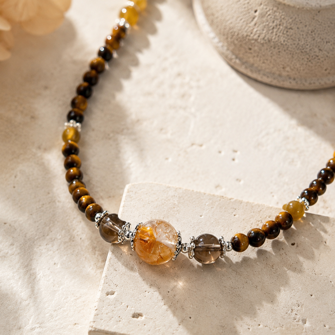 Close-up of tiger’s eye beads, amber accents, and sterling silver details in Tiger’s Eye & Amber Beaded Layering Necklace