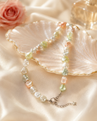 Close-up of irregular pastel shell pearls and silver-tone star charm in Celeste Pastel Shell Pearl Charm Necklace