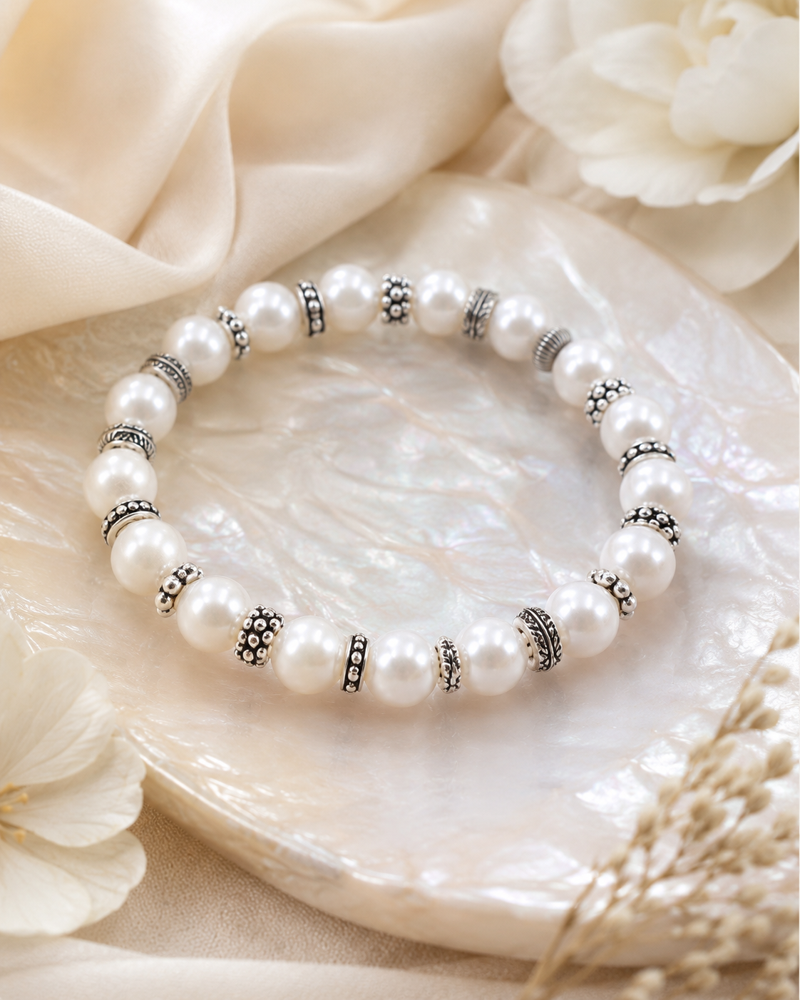 Close-up of lustrous freshwater pearls and vintage sterling silver spacer beads in Elara Freshwater Pearl Sterling Silver Bracelet