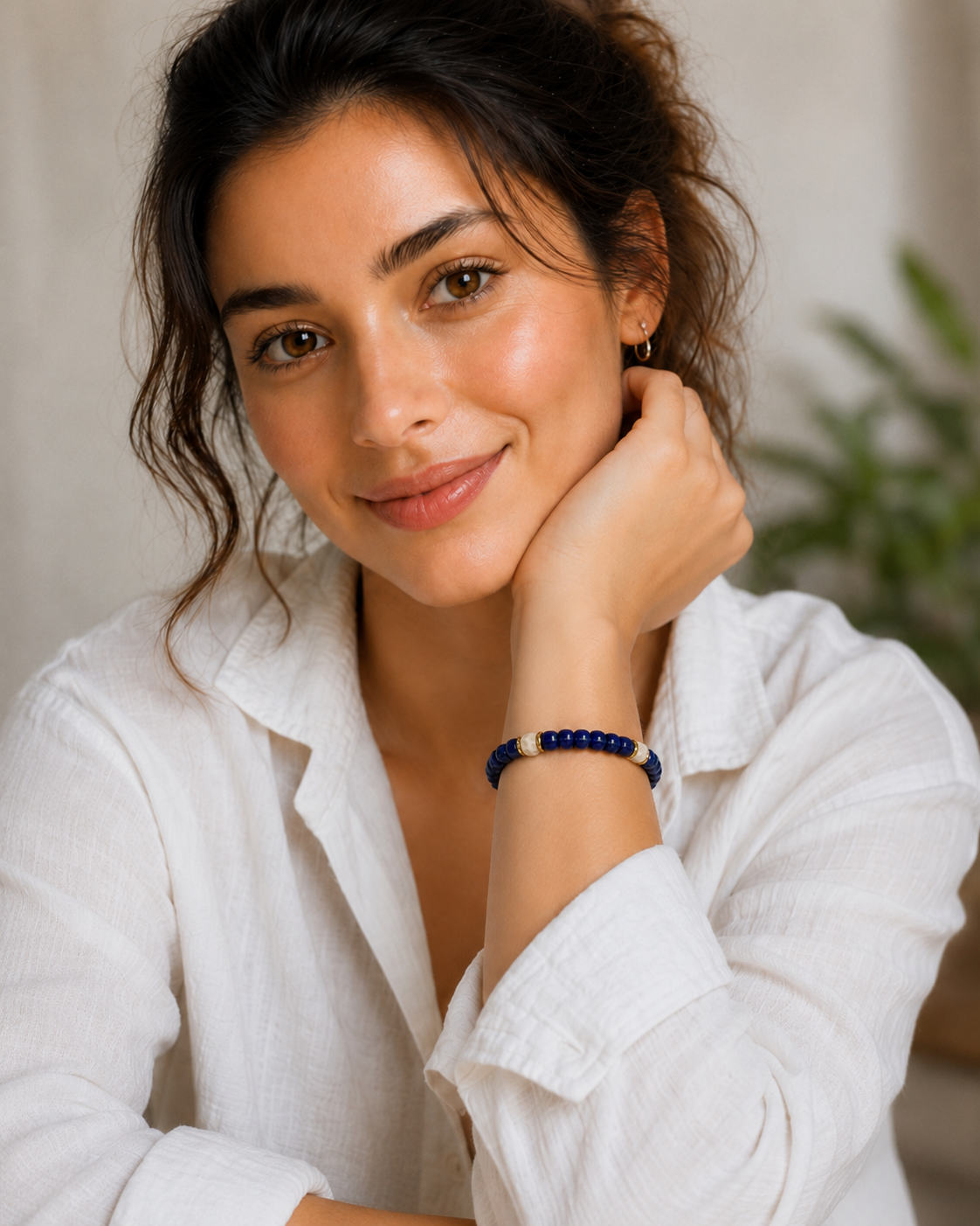 Model wearing Lapis Lazuli Stretch Bracelet with a white linen shirt