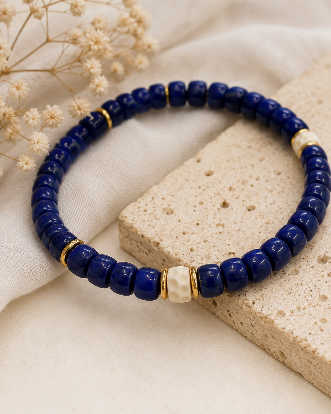 Close-up of cobalt lapis lazuli beads, resin accents, and sterling silver details in Lapis Lazuli Stretch Bracelet