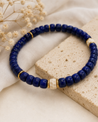 Close-up of cobalt lapis lazuli beads, resin accents, and sterling silver details in Lapis Lazuli Stretch Bracelet