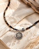 Close-up of faceted pietersite beads and sterling silver pendant in Sahara Pietersite Sterling Silver Pendant Necklace