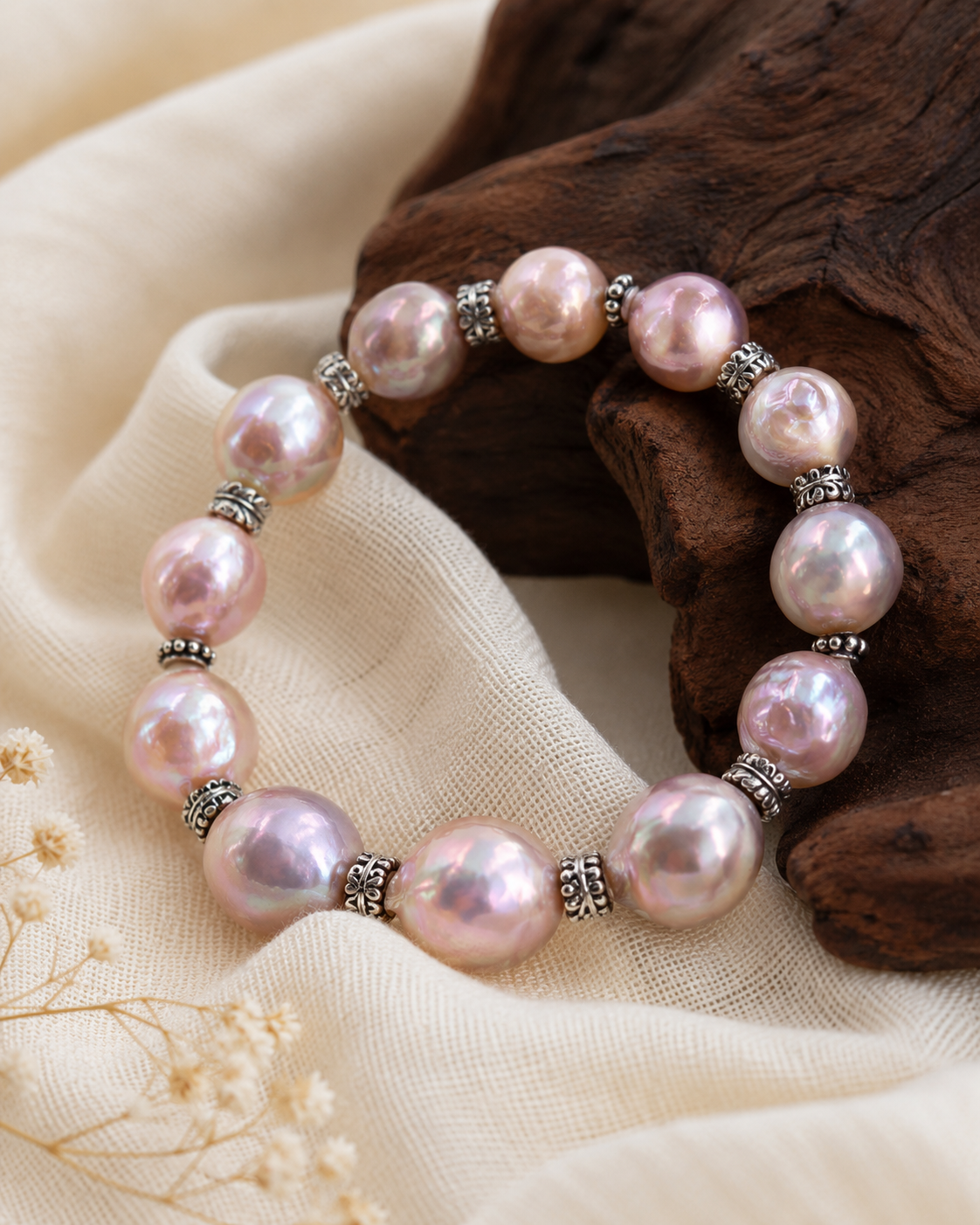 Close-up of irregular iridescent freshwater pearls and vintage Tai silver spacer beads in Serena Iridescent Freshwater Pearl Bracelet