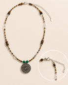 Solstice Tiger’s Eye Quartz Pendant Necklace lobster clasp, adjustable chain, and sterling silver pendant detail