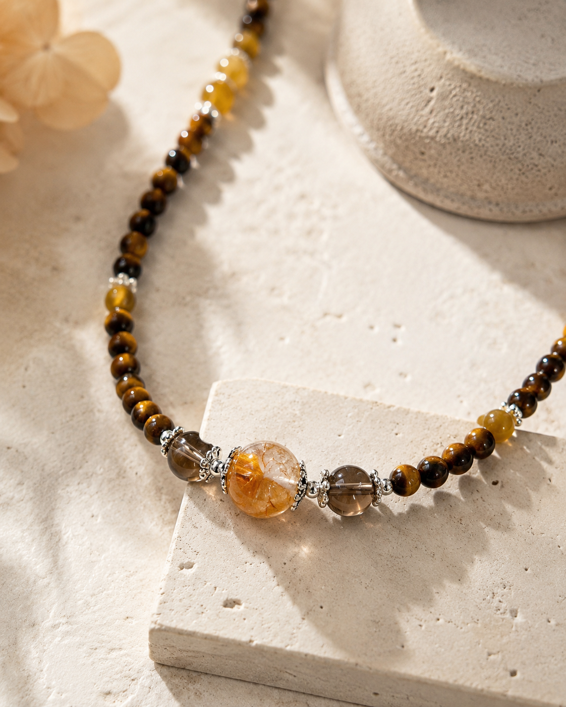 Close-up of tiger’s eye beads, amber accents, and sterling silver details in Tiger’s Eye & Amber Beaded Layering Necklace