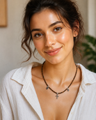 Model wearing Tiger’s Eye Cross Charm Beaded Necklace with casual summer outfit